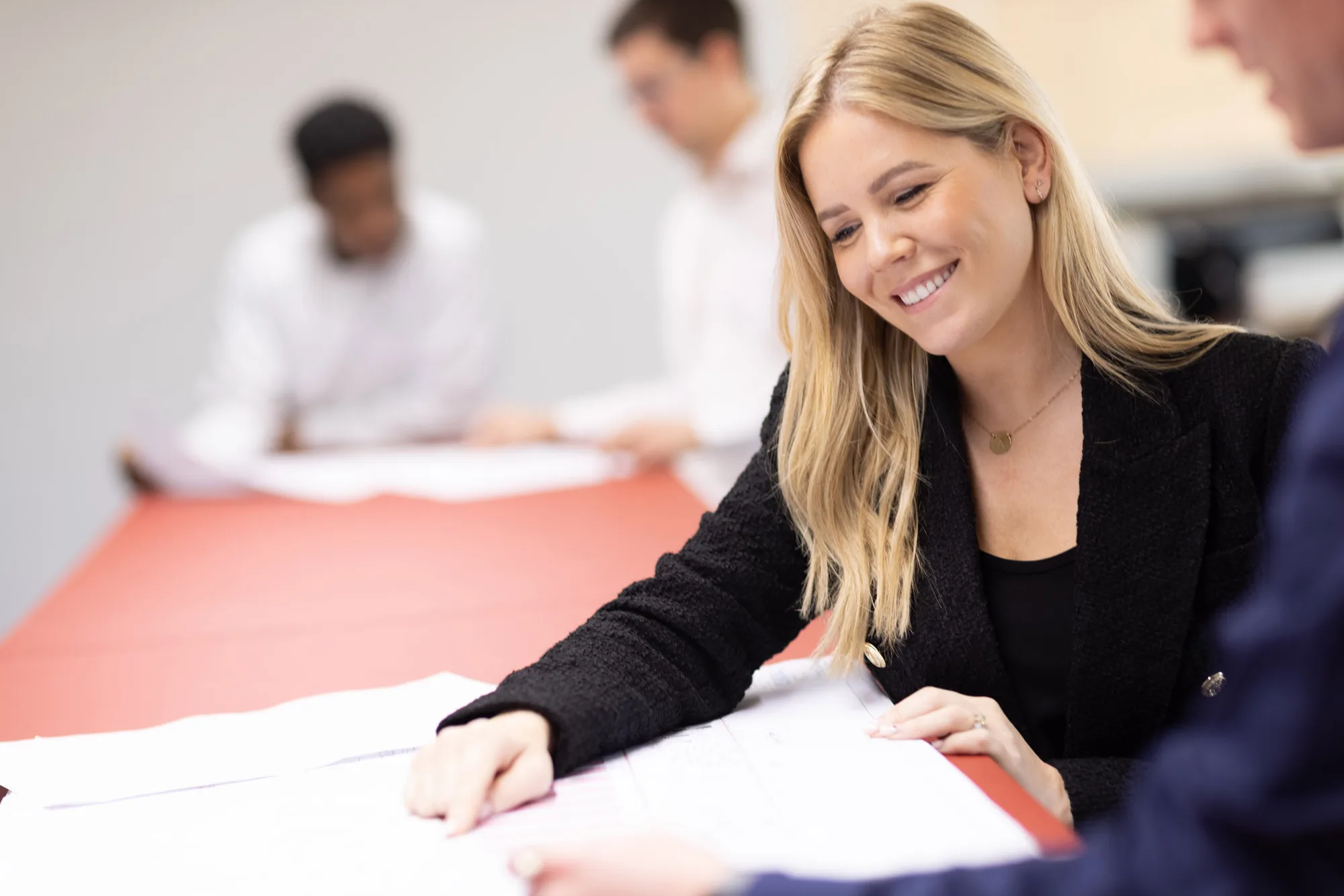 Staff reviewing a document