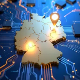 A 3D map of Germany placed on a circuit‑board background, with glowing points of light and a location pin marking Berlin. Visible circuit traces and components surround the map.