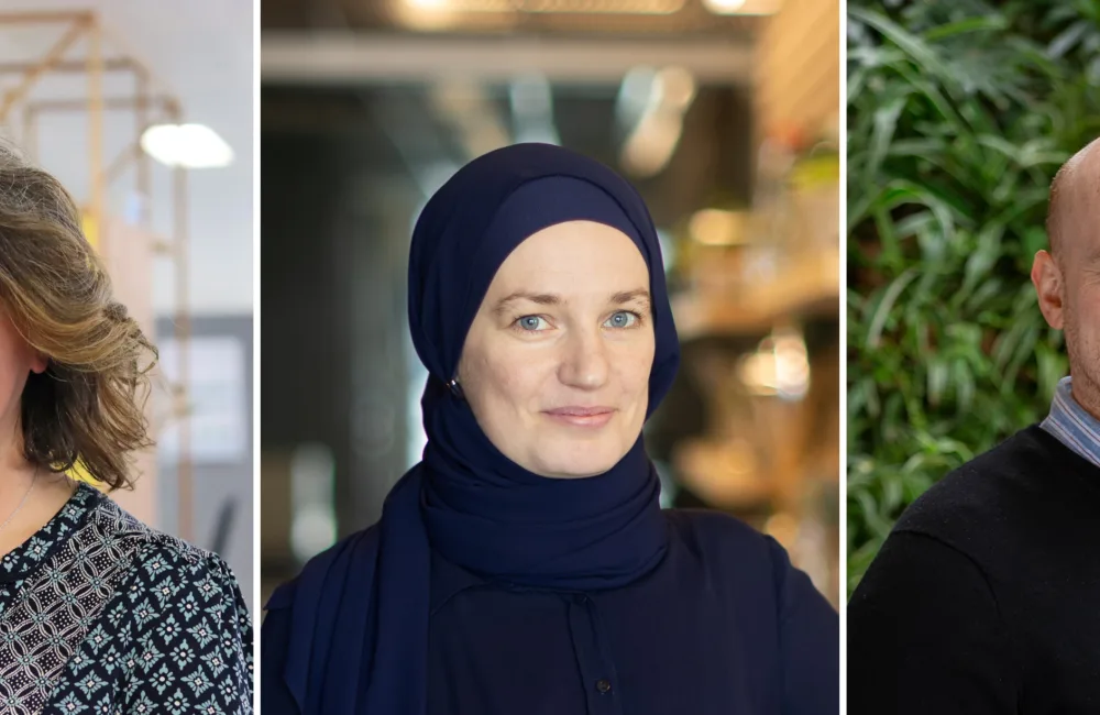 Three side‑by‑side portrait photos showing individuals indoors and outdoors. From left to right: a person with shoulder‑length hair in a patterned top inside an office setting; a person wearing a dark head covering and dark top indoors; and a person with closely cropped hair wearing a dark sweater, standing in front of green plants.
