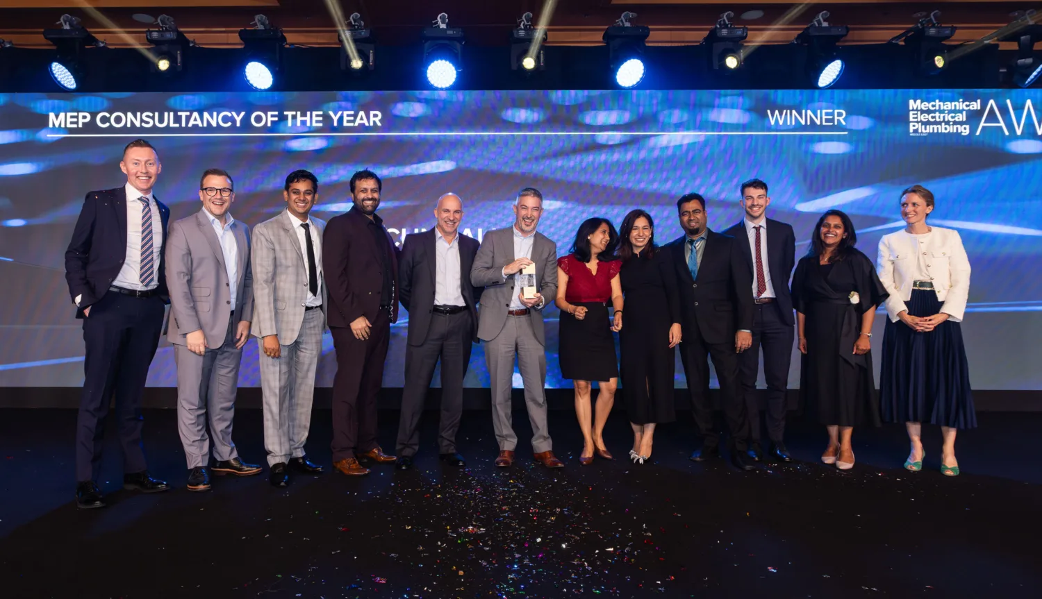 Team Cundall MEP team with award on MEP awards stage