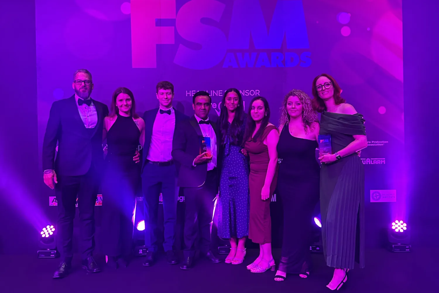 Security team members receiving awards at the FSM Awards 2025 ceremony.