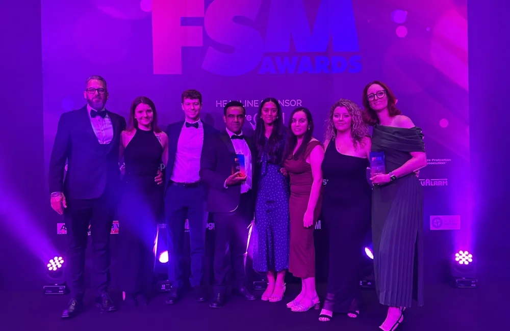 Security team members receiving awards at the FSM Awards 2025 ceremony.