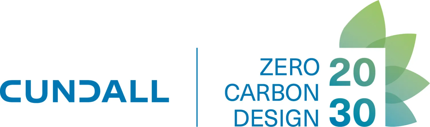 Cundall logo in blue text on the left, separated by a vertical line from “ZERO CARBON DESIGN 2030” on the right; “20” and “30” are stacked with a green and blue leaf graphic behind them.
