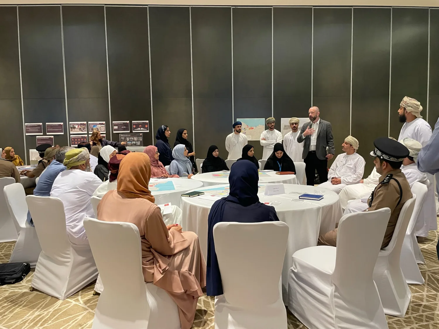 Steven Fry Harris conducting a workshop with the Greater Muscat team