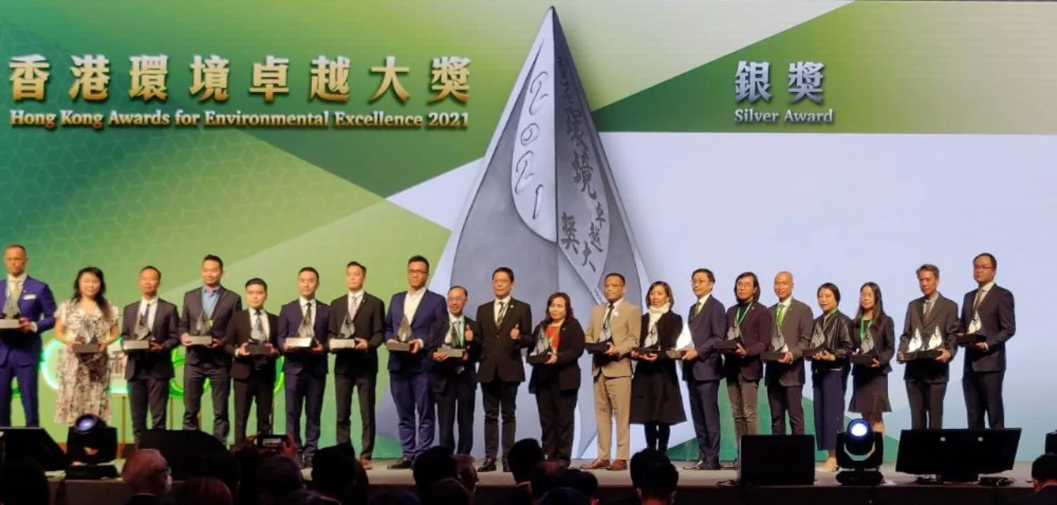 All of the winners posing for a photo on stage