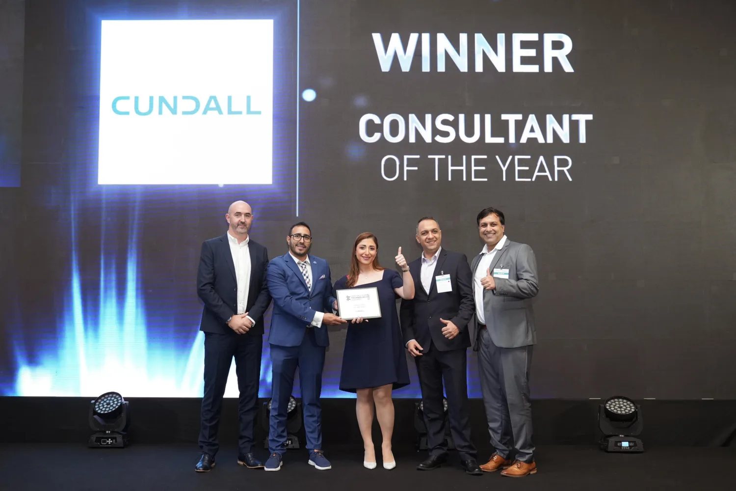 The Cundall team receiving the award on stage.