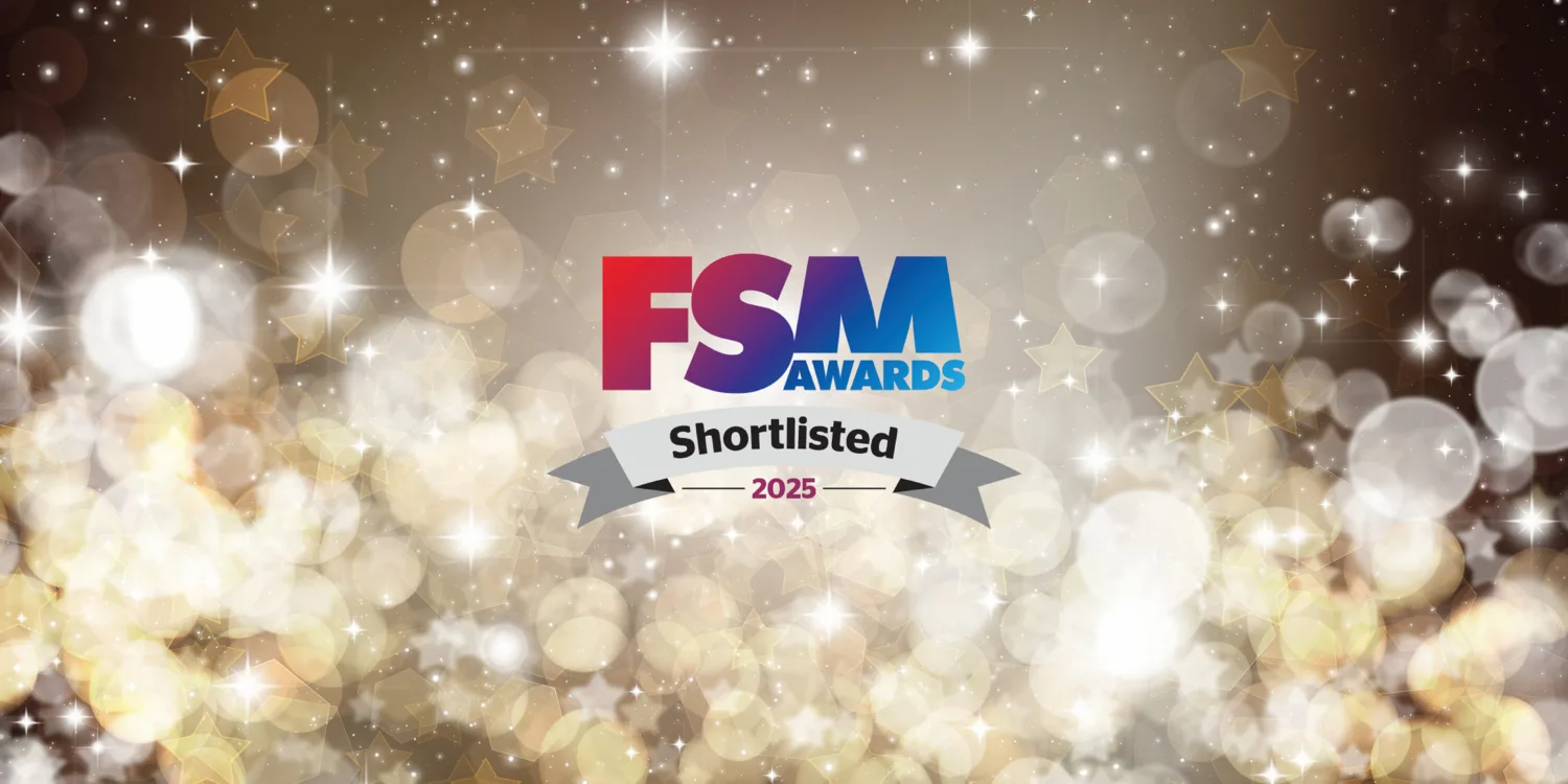 FSM Logo against a black and gold spakly background