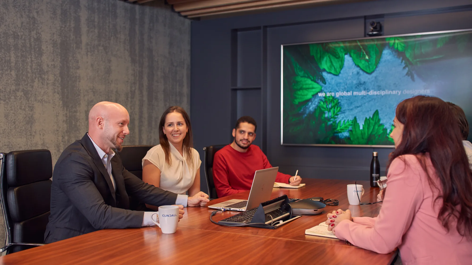 Marc Lynch in a meeting with colleagues