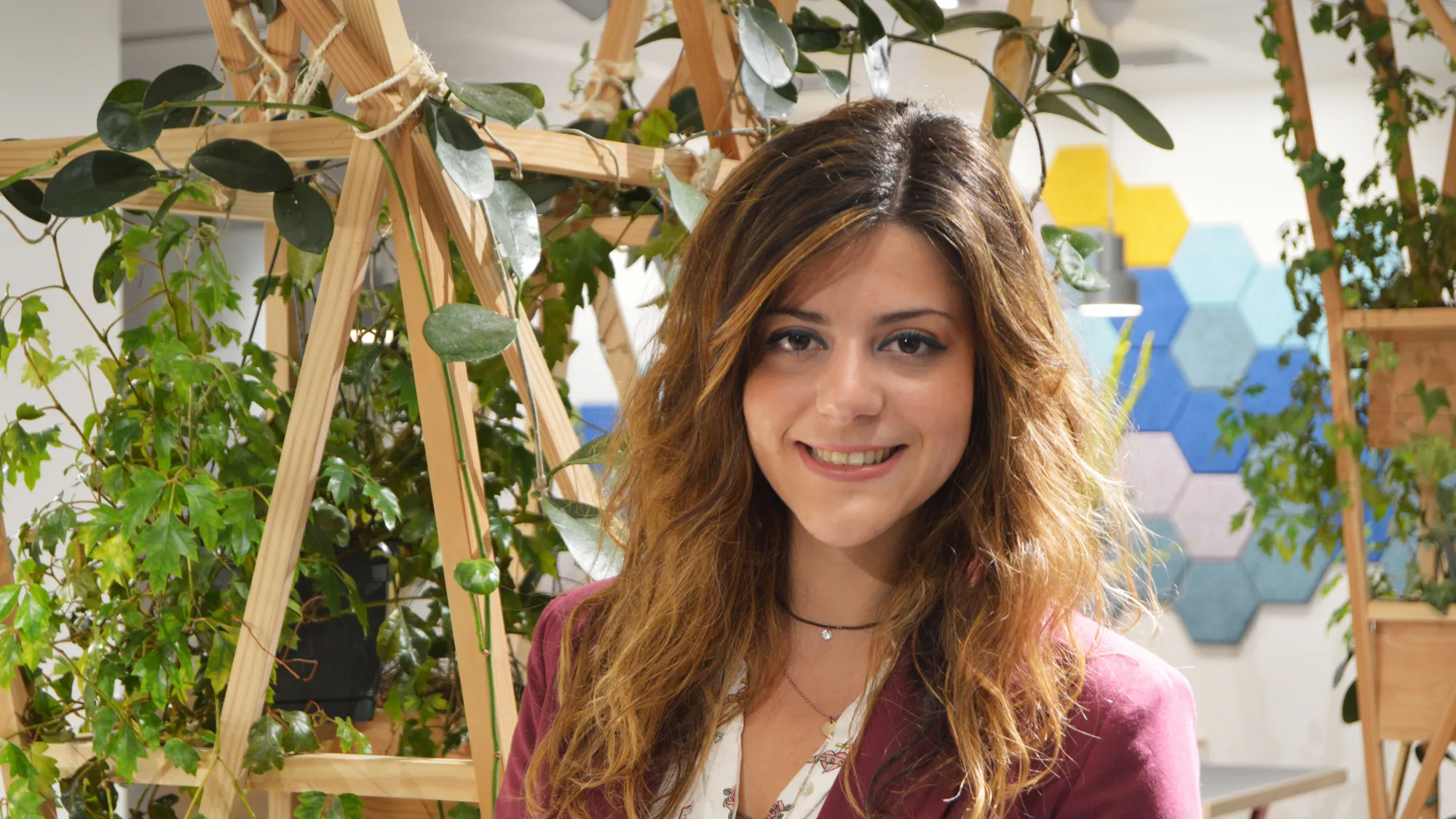 Maria Anna smiling and looking at the camera