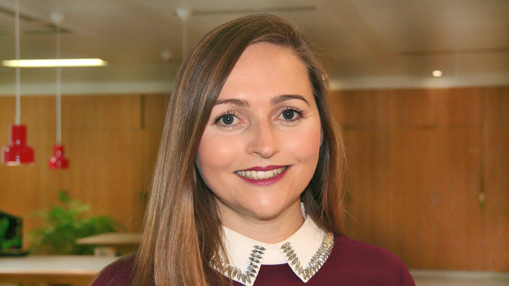 Head and shoulders shot of Nella in London office