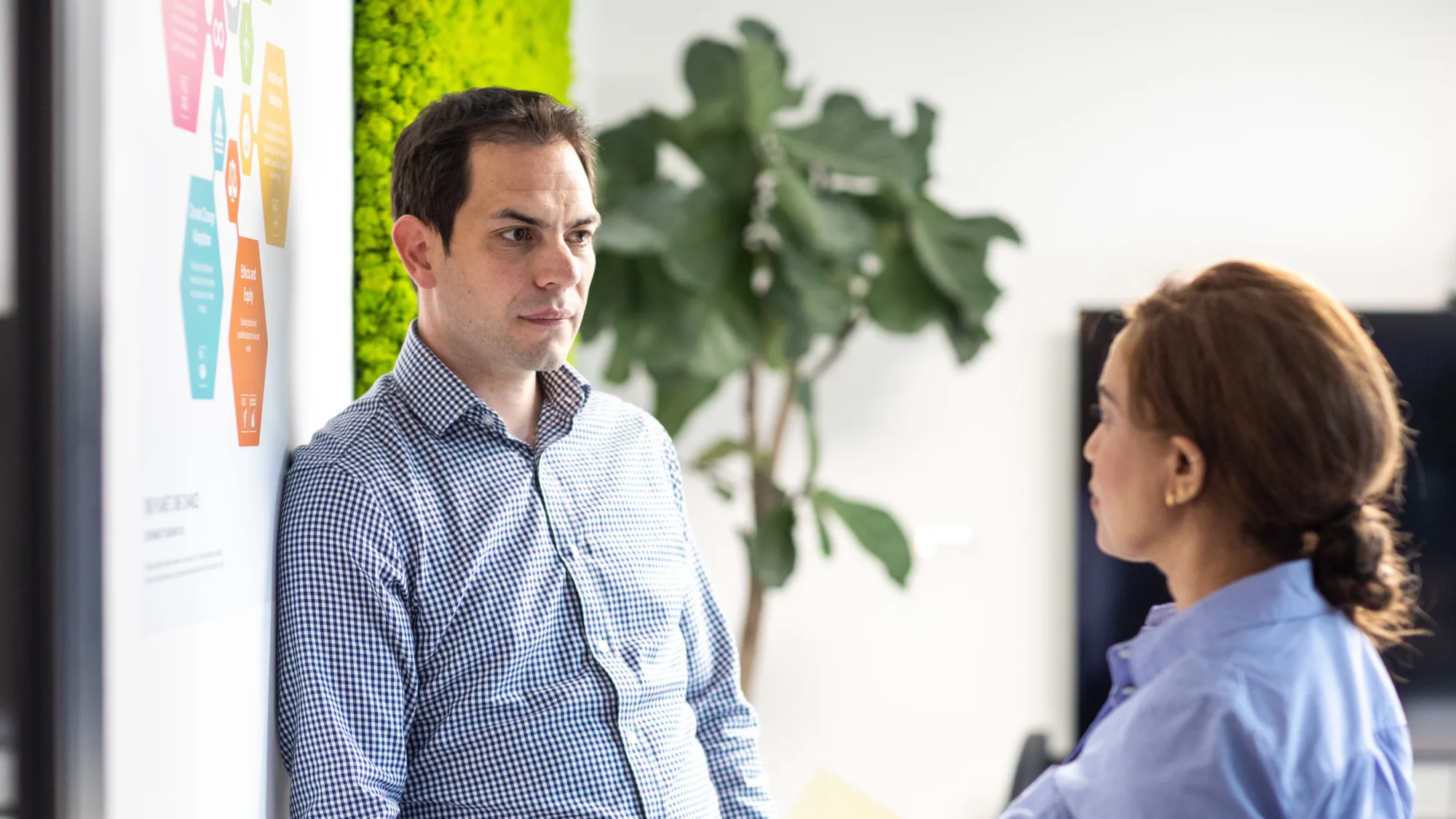 Simon Wyatt in meeting with colleague