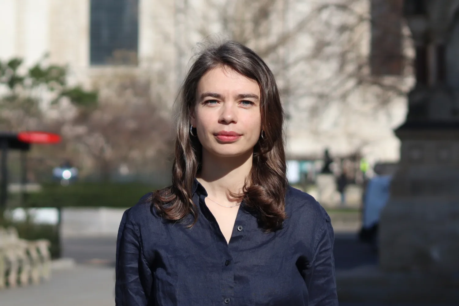 Head and sholders shot of Vera wearing a dark blue top with St Pauls cathedral in background