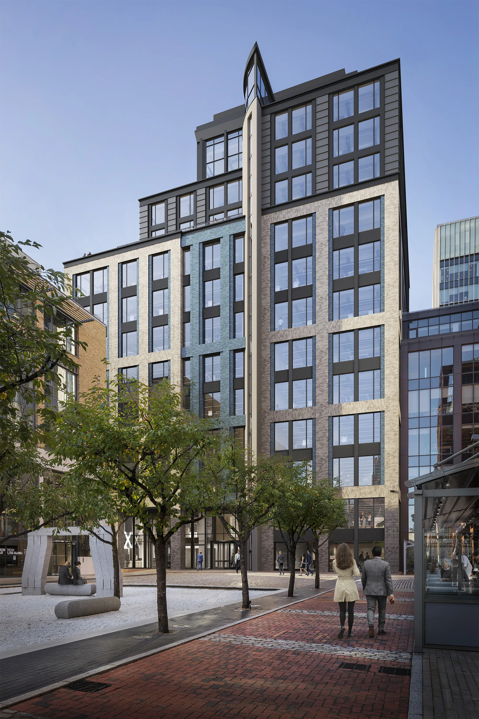 Exterior view of modern façade, with large glass windows.