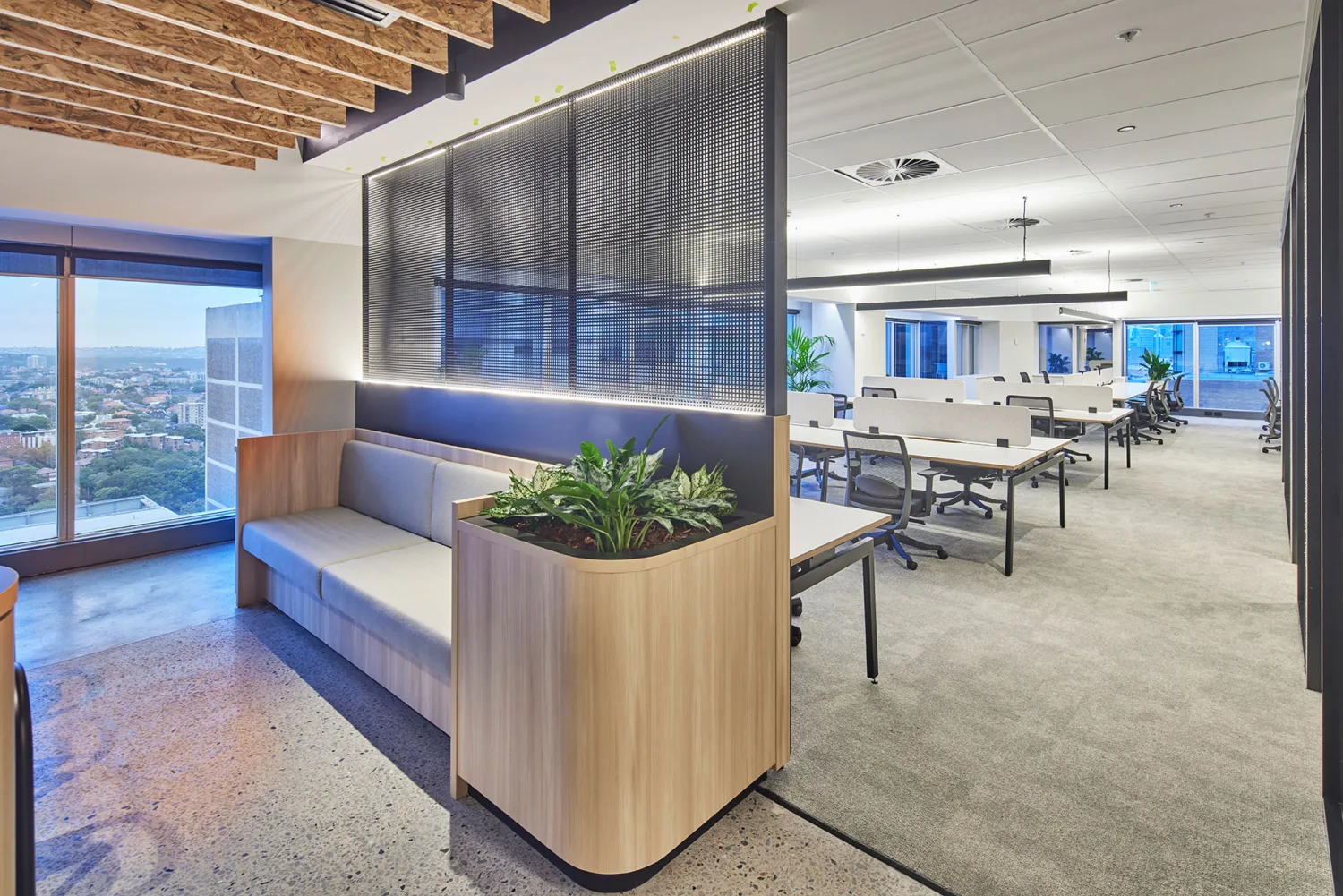 Brightly lit workspaces with separate collaboration space