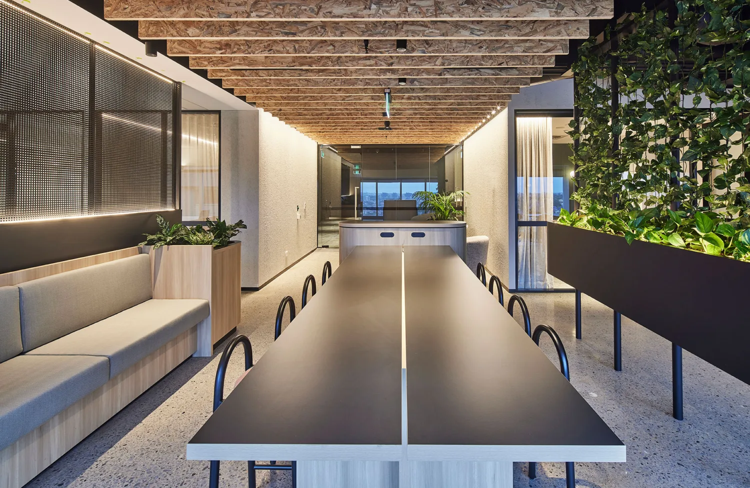 Collaboration area within office space including dining table