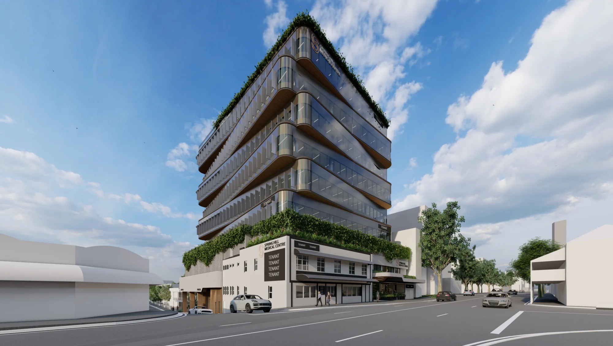 Zoomed out street view of entire building with blue sky behind it.