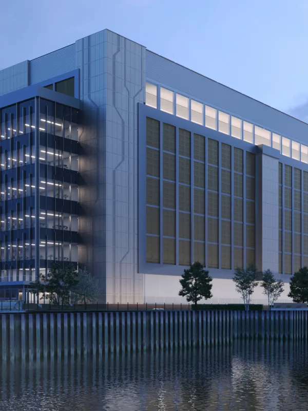 Evening view of Ada Infrastructures Docklands Data Centre from the water