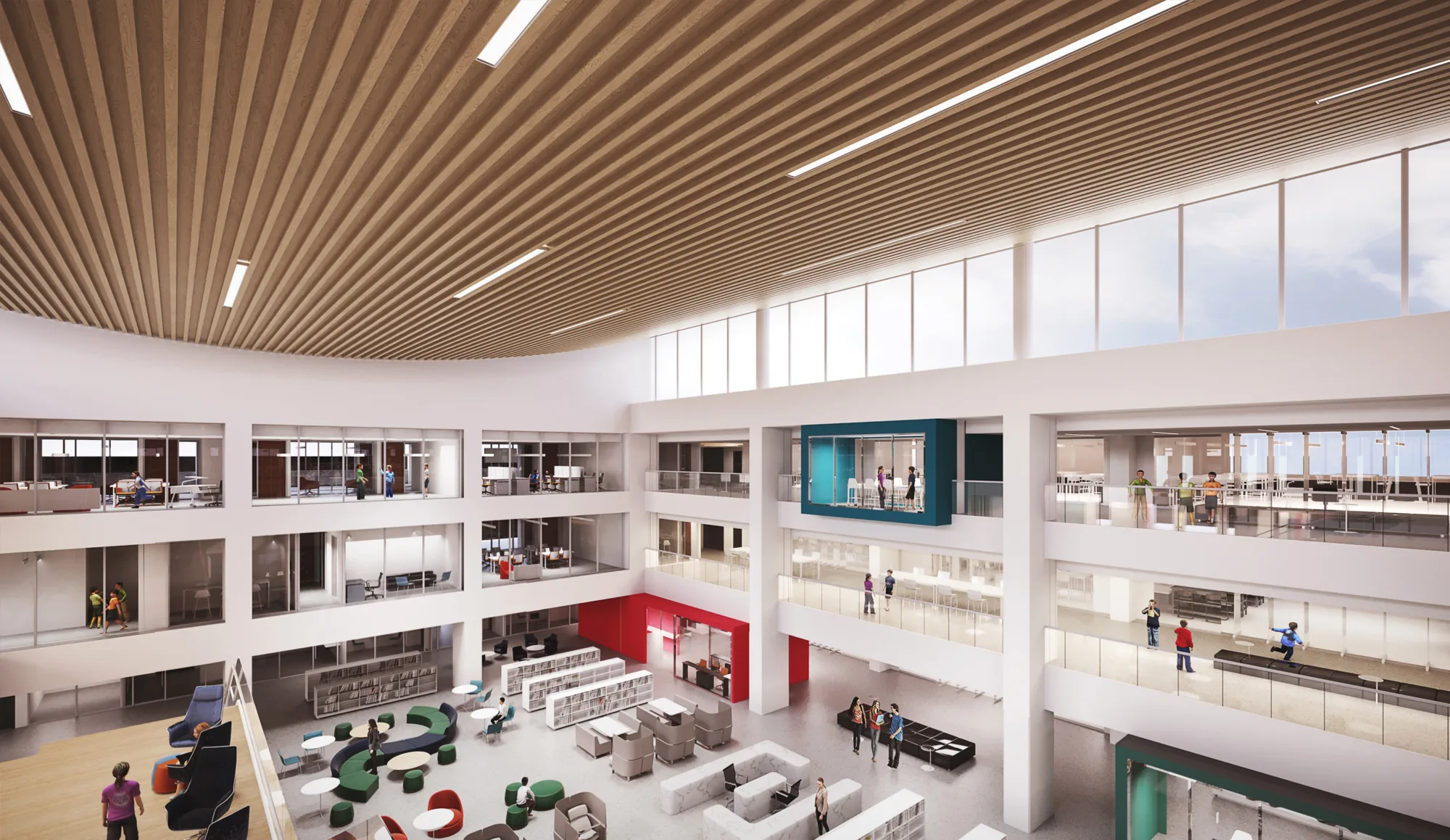Interior image of the campus. The campus has three storey and there are study areas on each storey. There are also books available on the first floor.