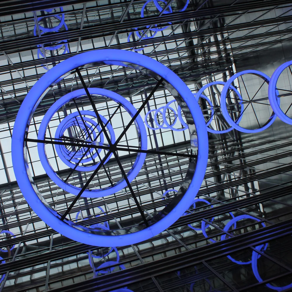Blue lighting from below in office atrium