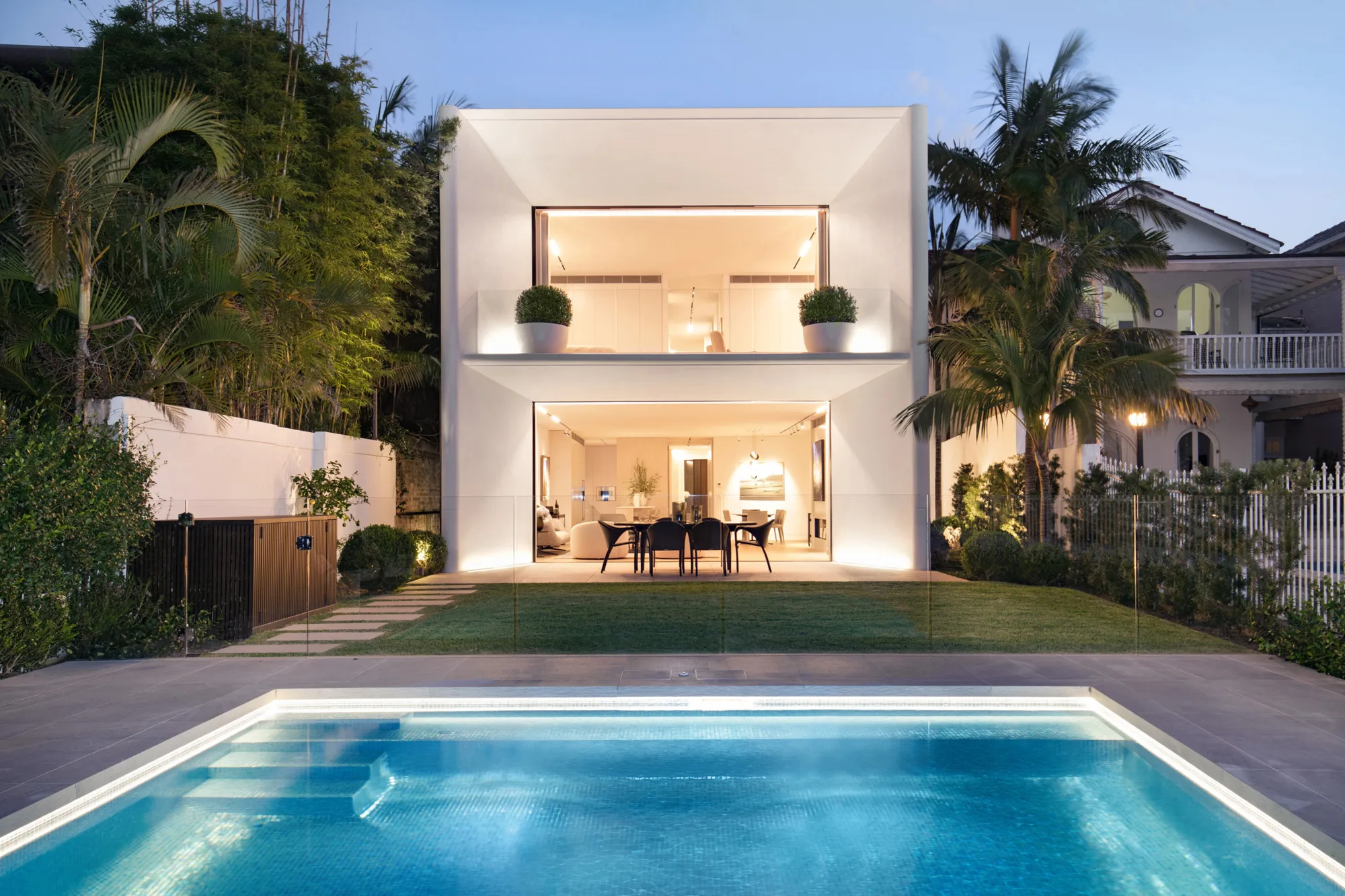 View of house from backyard, pool in foreground.