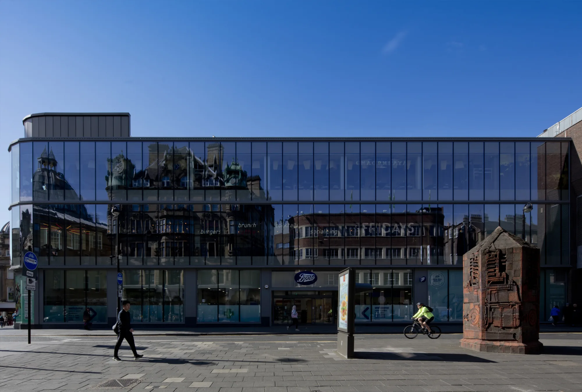 Exterior shopping centre against a blue sky