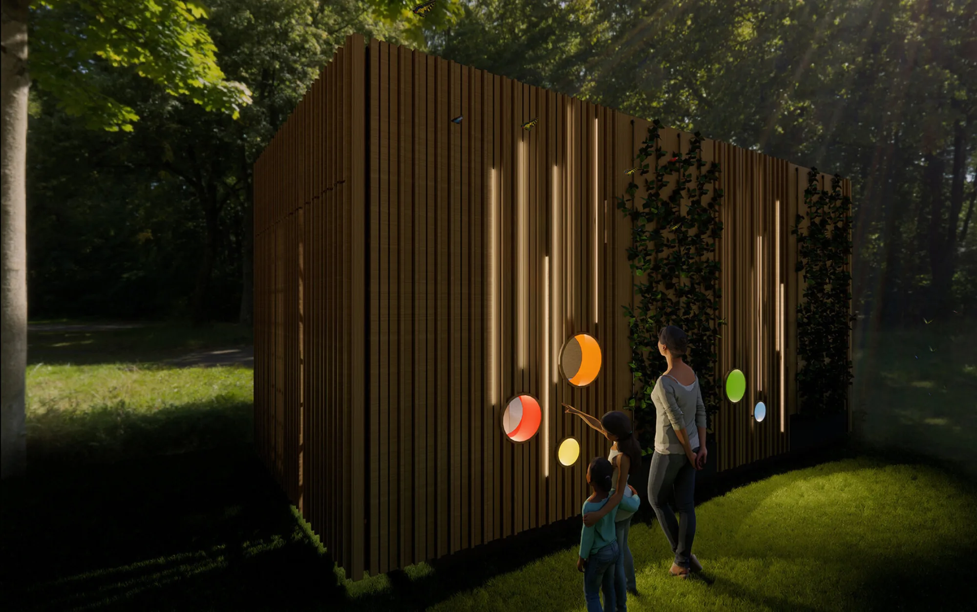 The pod at night in a park setting with children and adult looking at it all in 3D