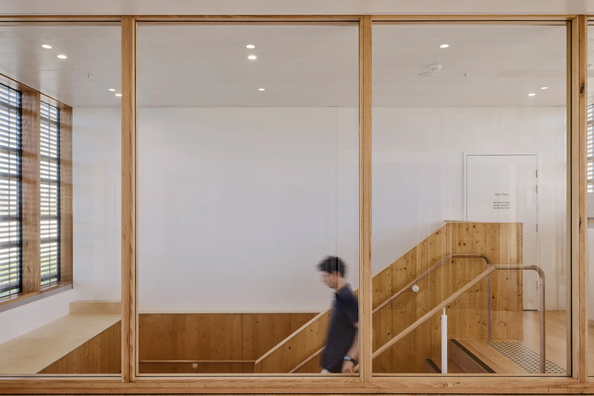 Person walking down a set of stairs