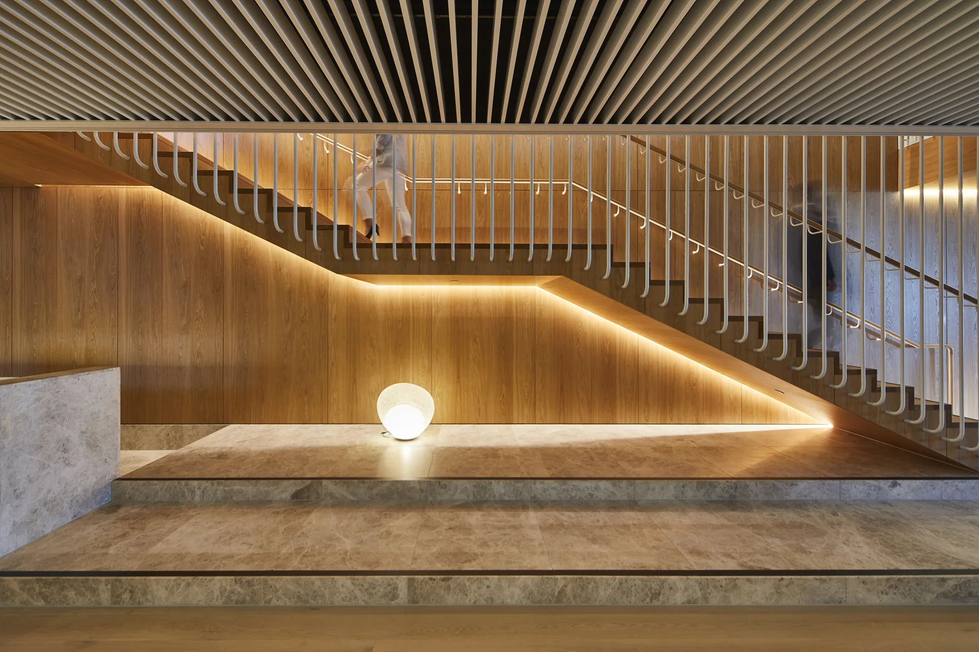 Statement staircase with bespoke lighting