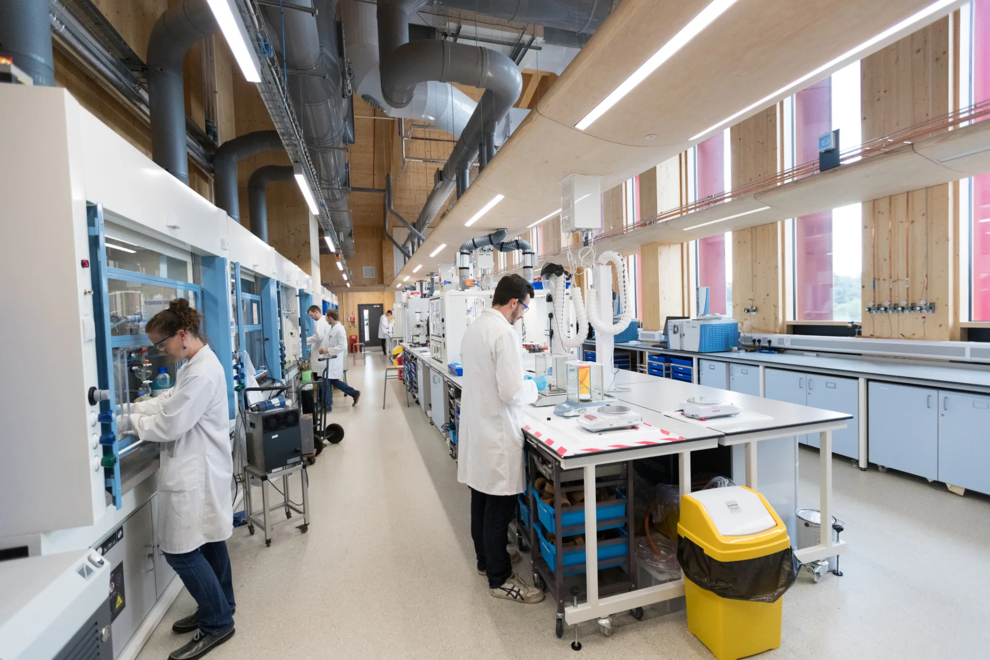 Scientists working in the Wolfson Catalysis Laboratory within GSK Carbon Neutral Laboratories for Sustainable Chemistry building