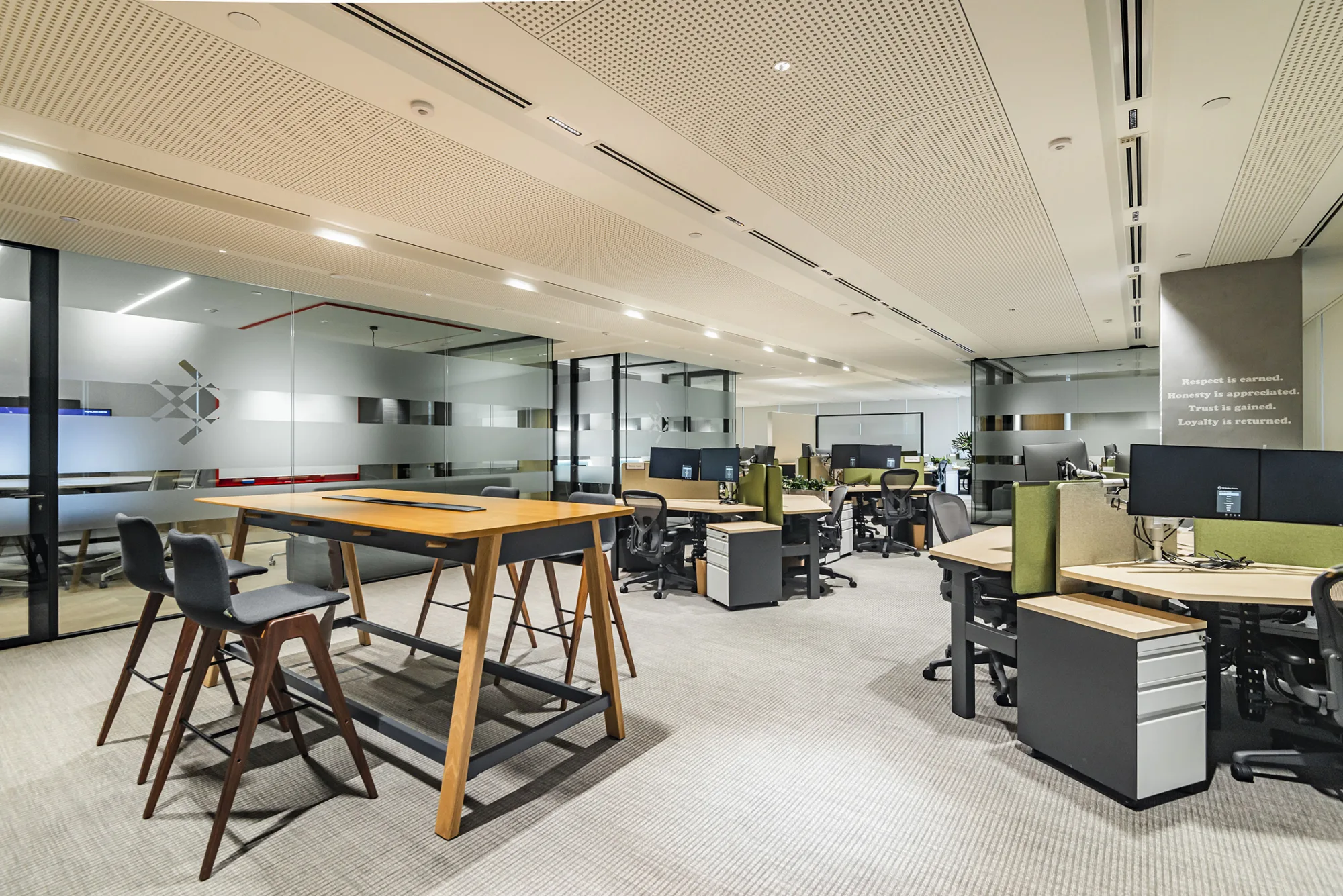 The office working space with meeting rooms on the side.