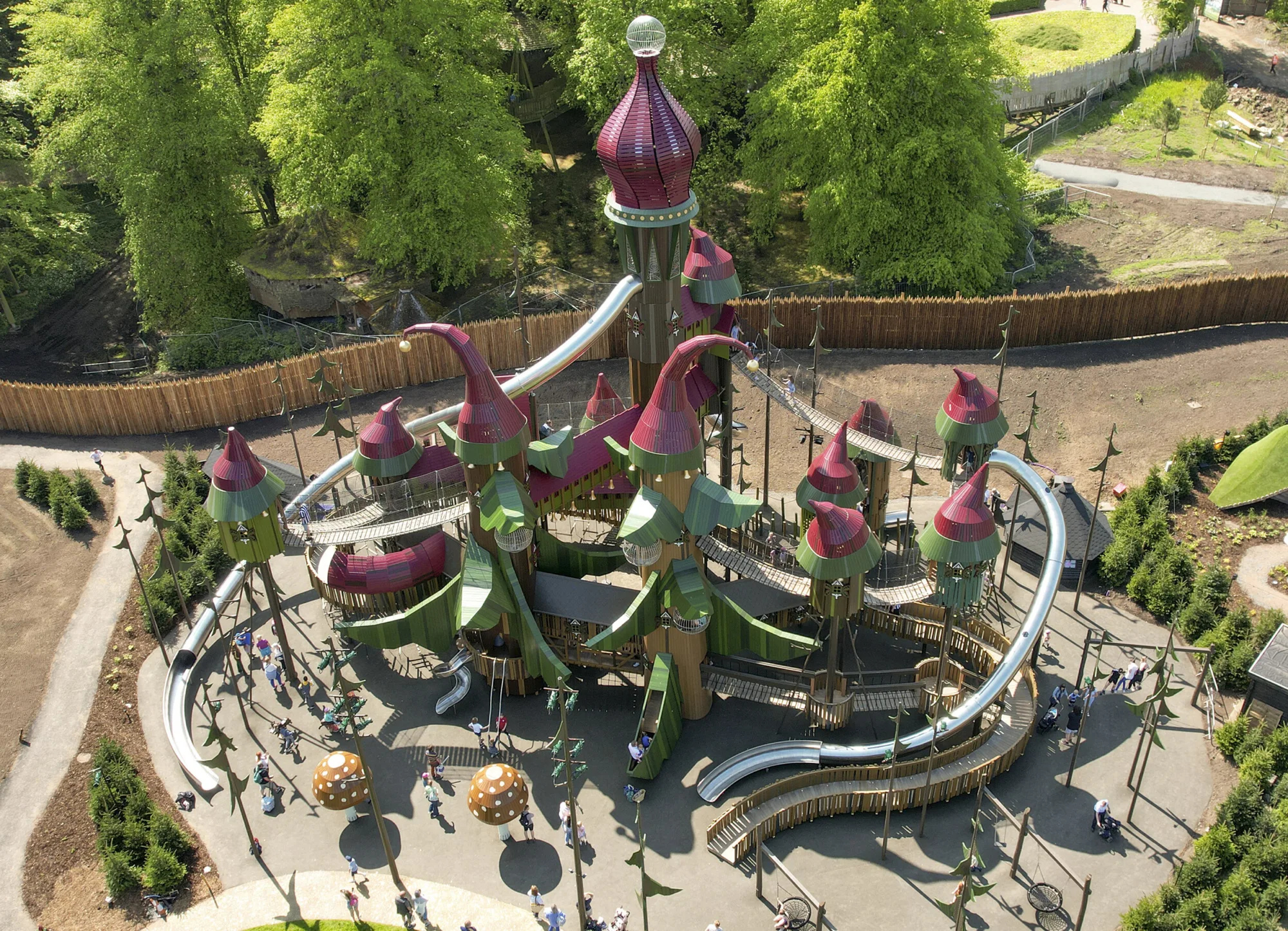 Lilidorei at Alnwick Garden drone view showing the play area and surrounding area with woodland