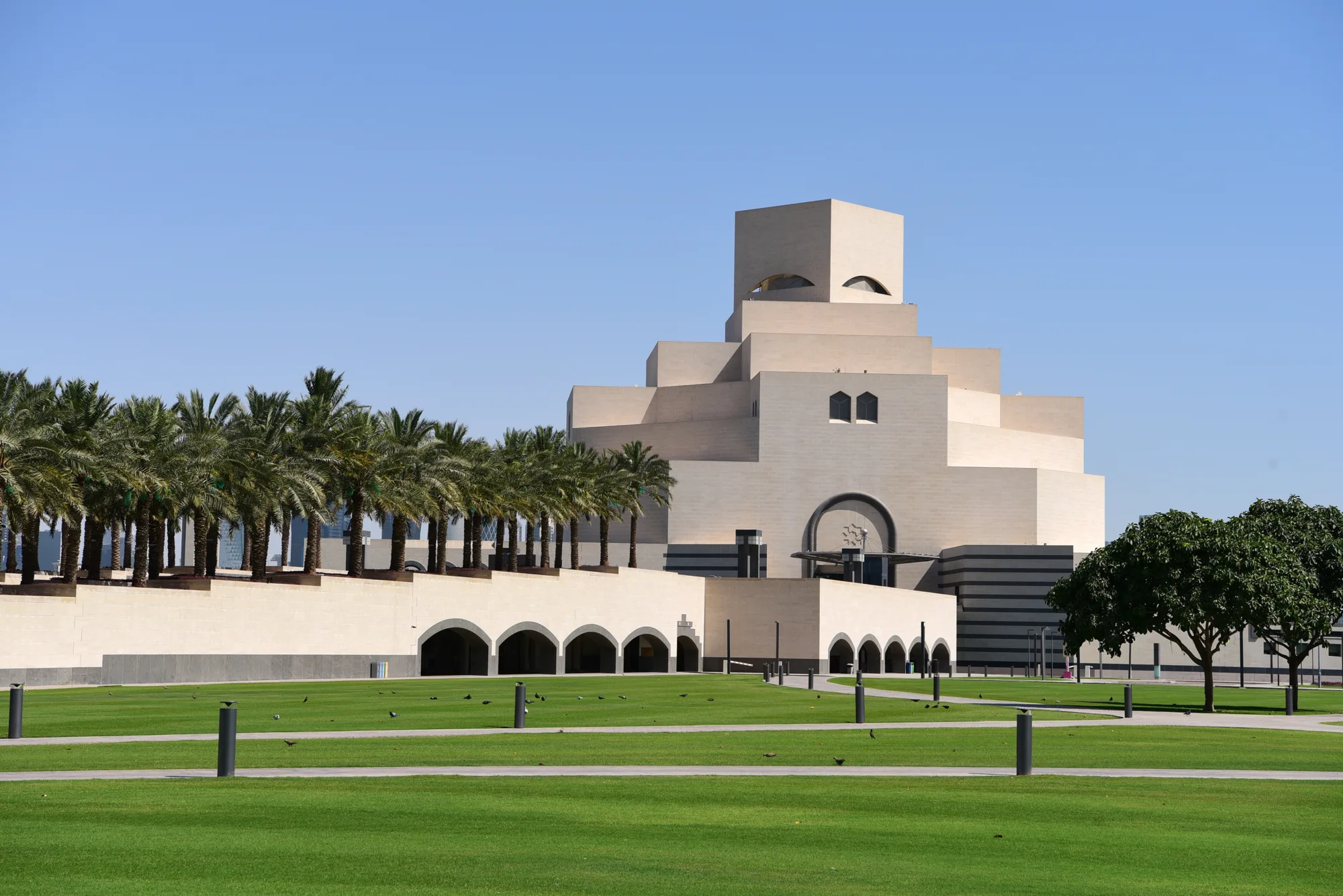 Museum of Islamic Art Qatar open field area with grass and trees