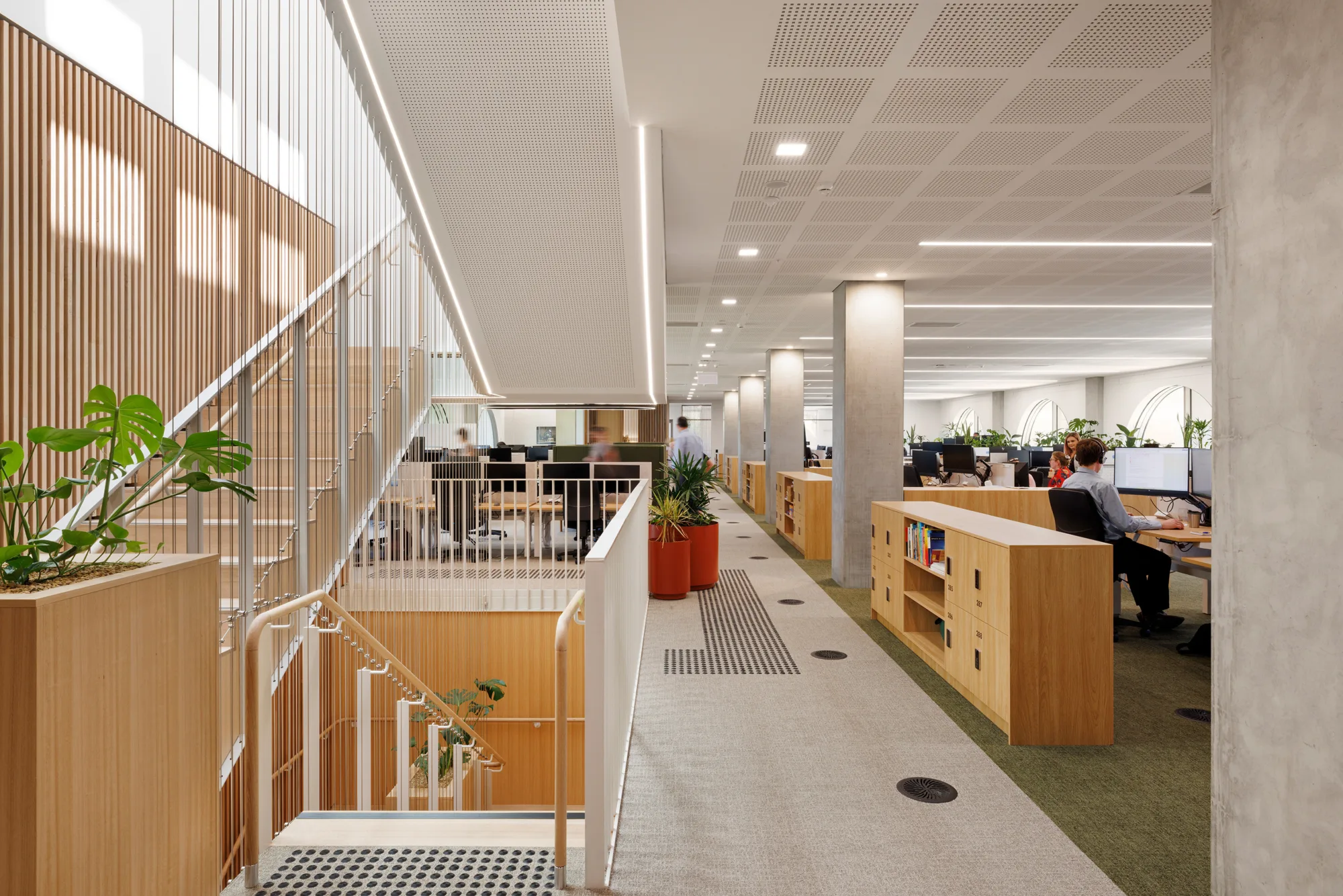 Office space displaying vents for the building’s underfloor air distribution system