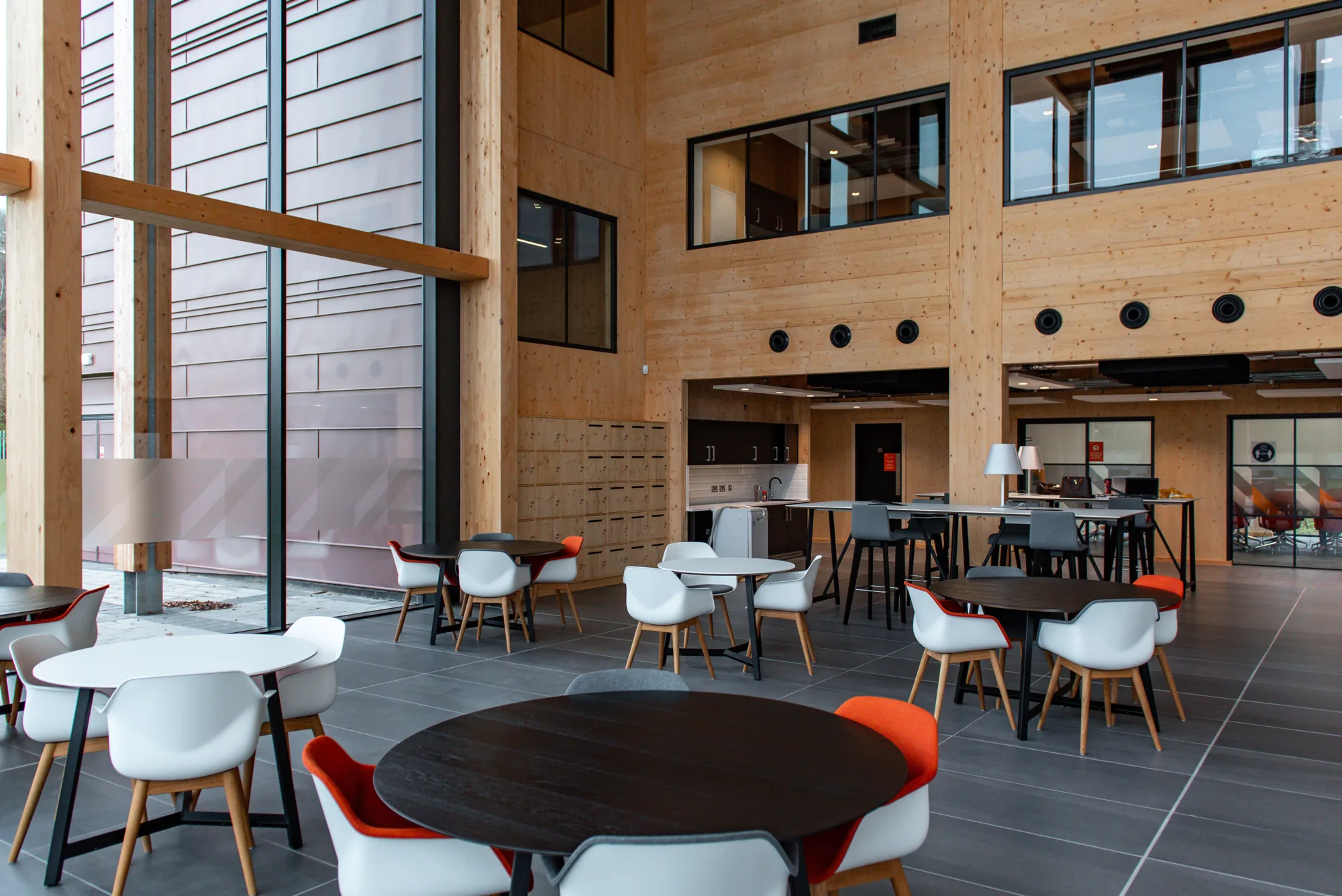 Round tables in the interior of the Midlands Centre for Cyber Security