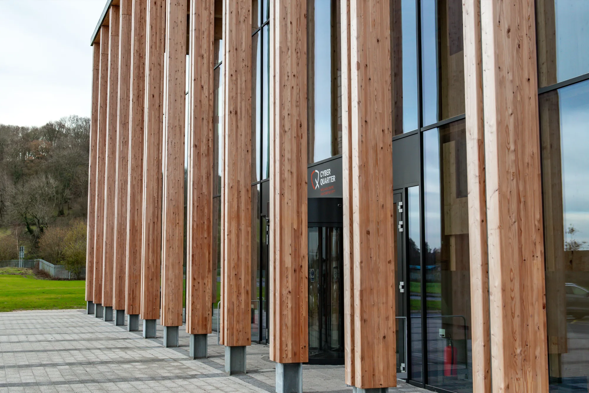 Exterior wood and glass facade of the Midlands Centre for Cyber Security