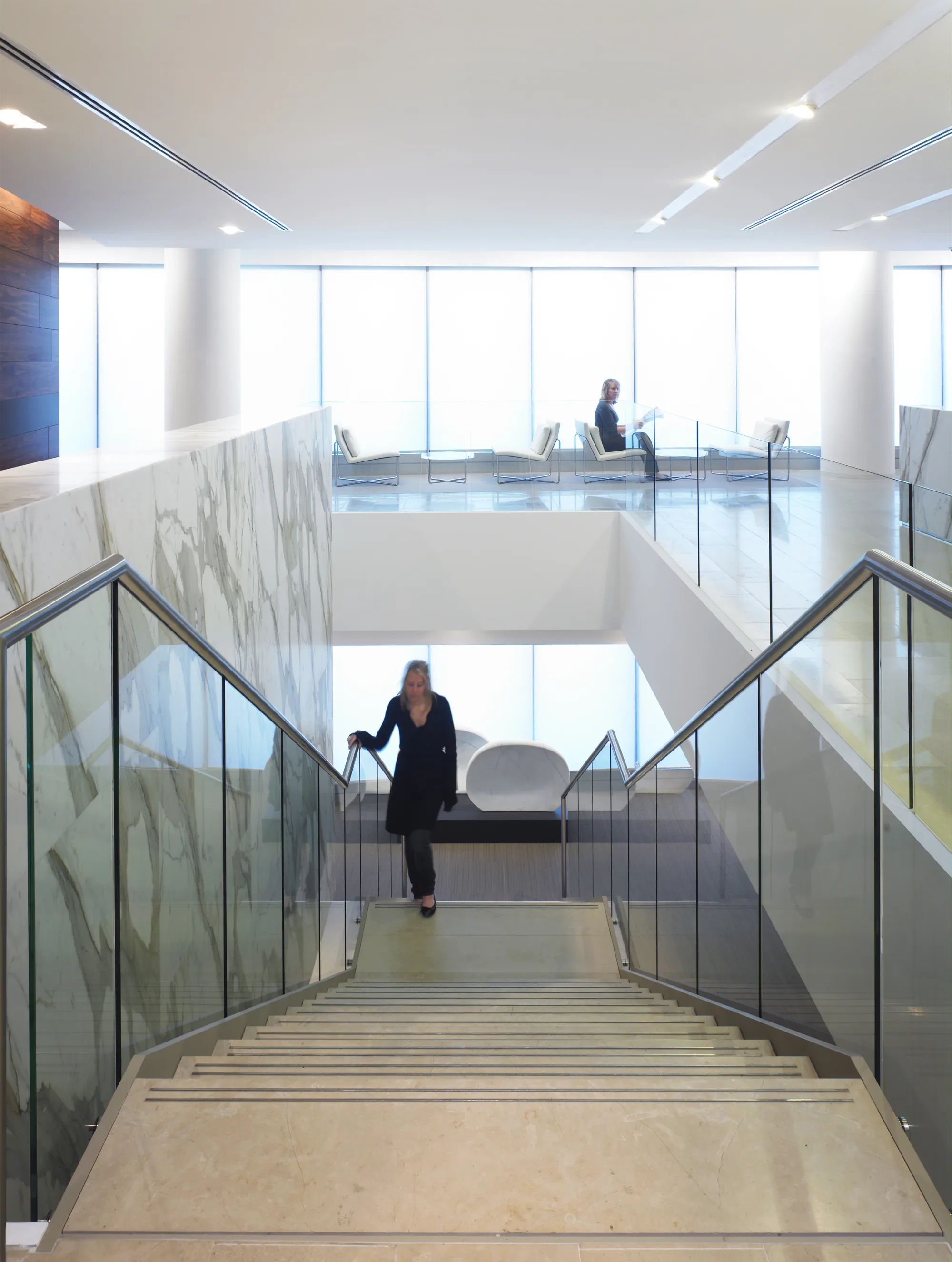Marble staircase leading to lower floor.