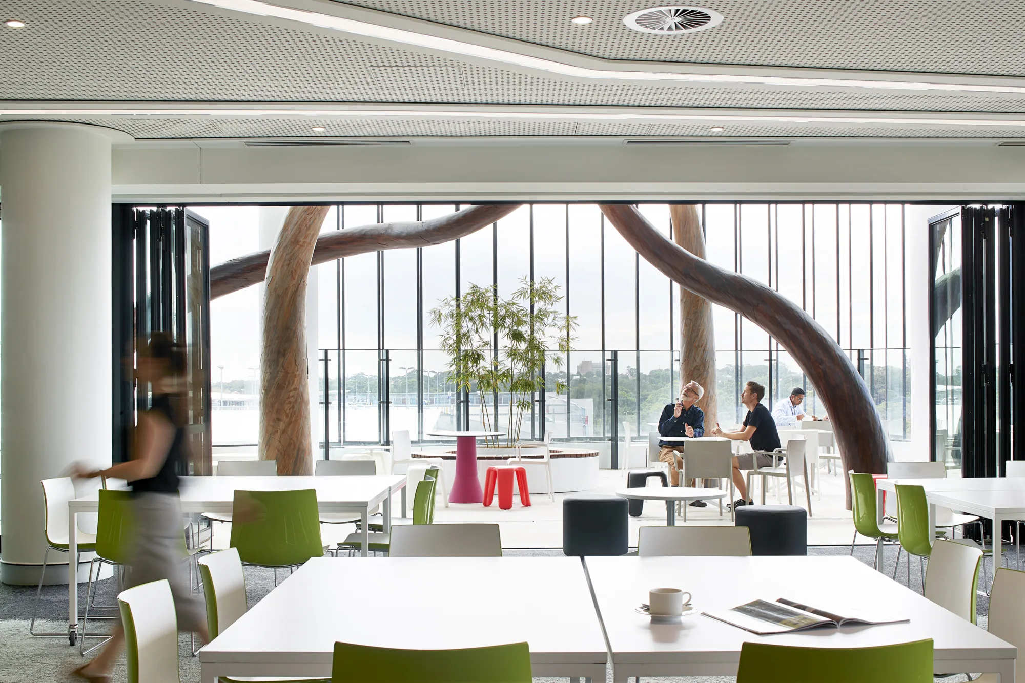 People using café and rest area inside the hospital.