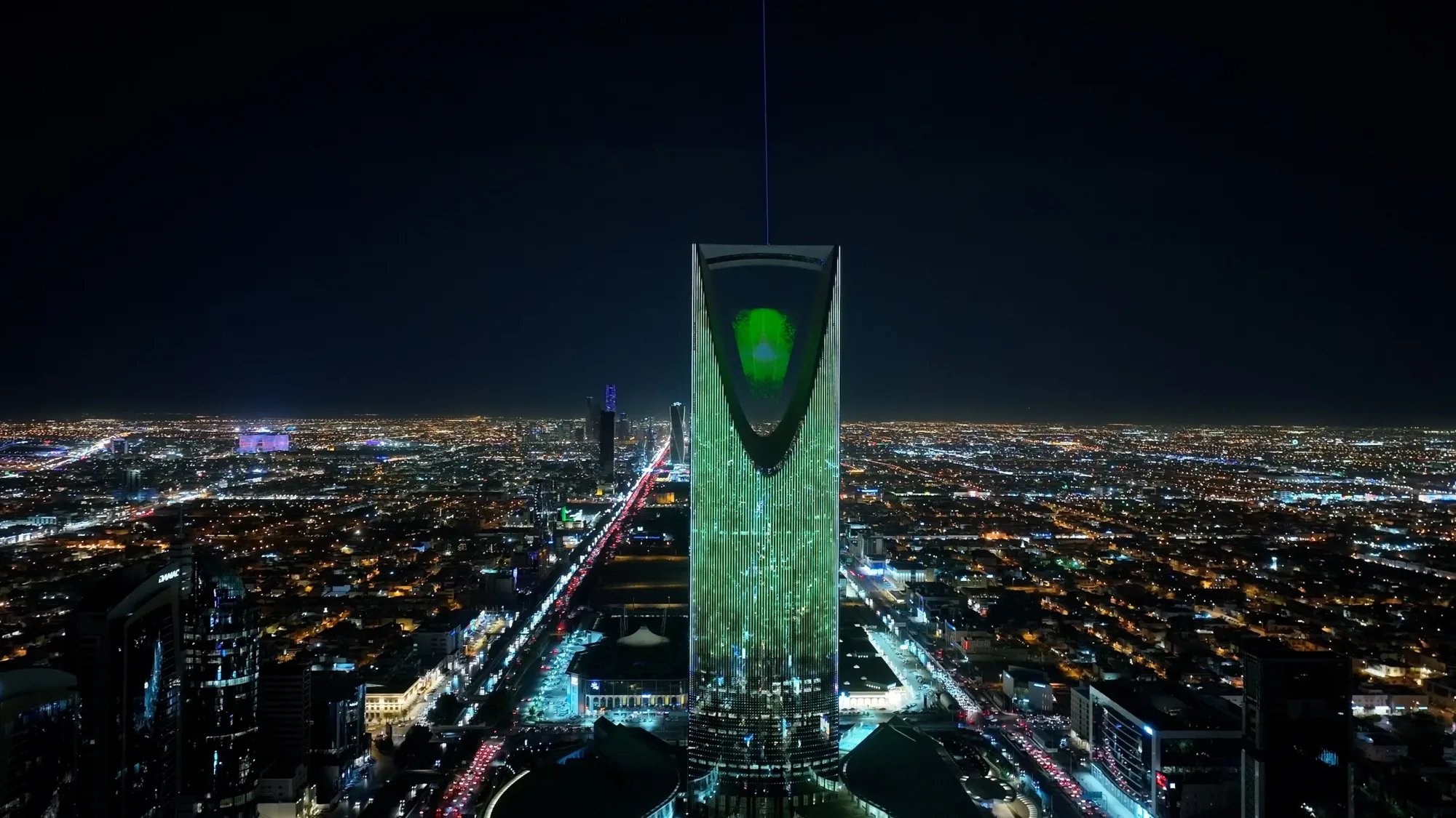 The art installation suspended in Kingdom Centre Tower illuminated in the night sky of Riyadh