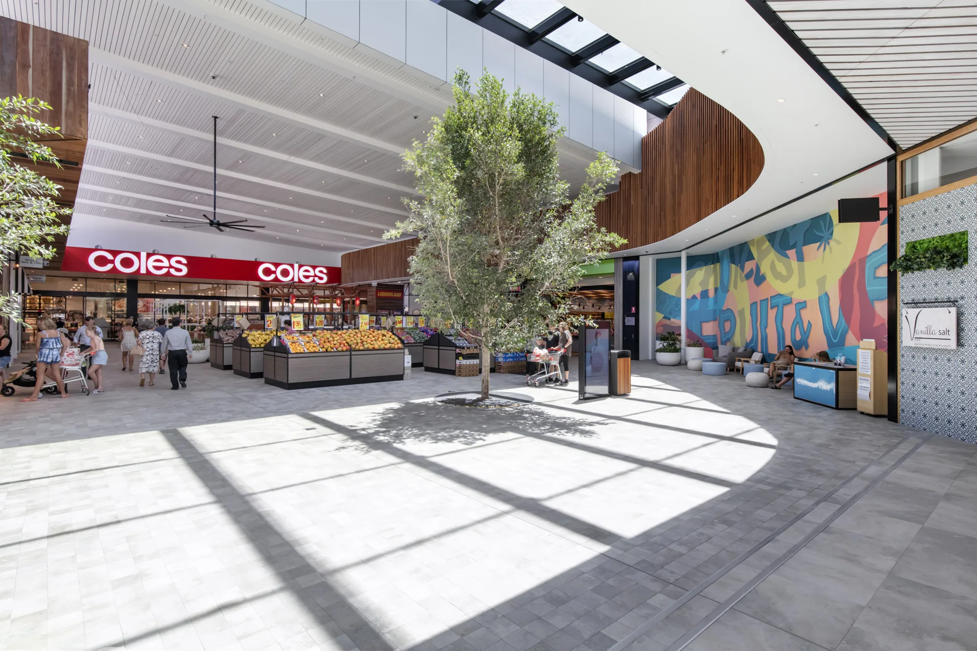 Indoor view of retail space and mural.