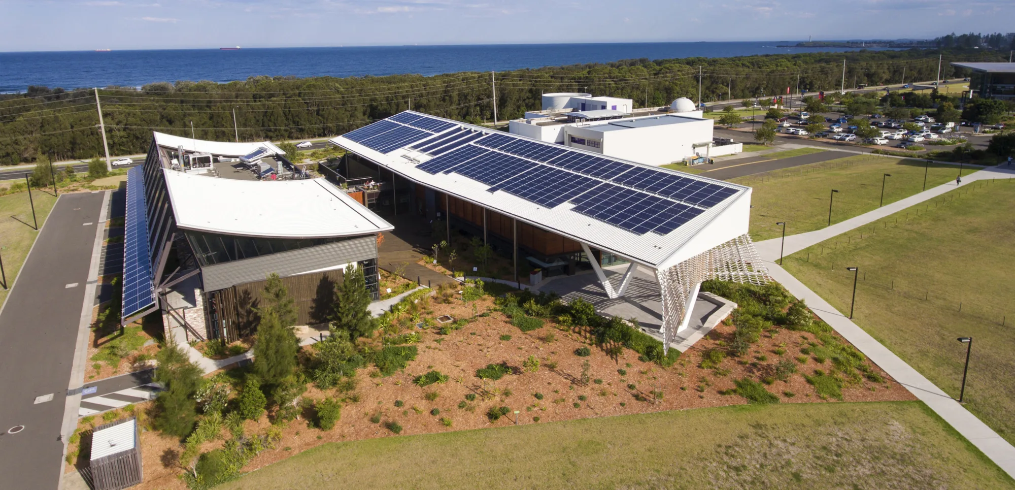 Aerial view of building showing solar panels