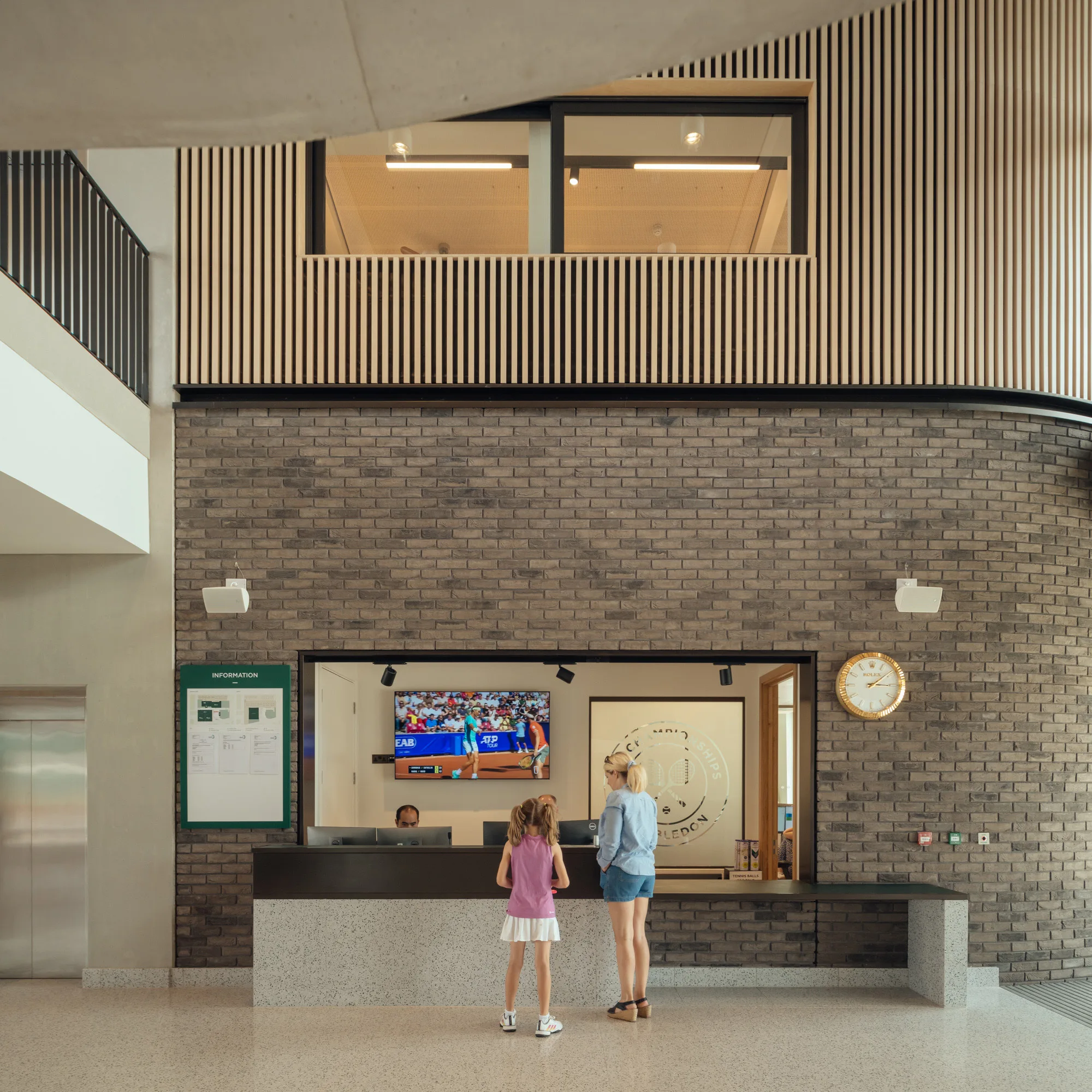 Atrium area reception in clubhouse with people in