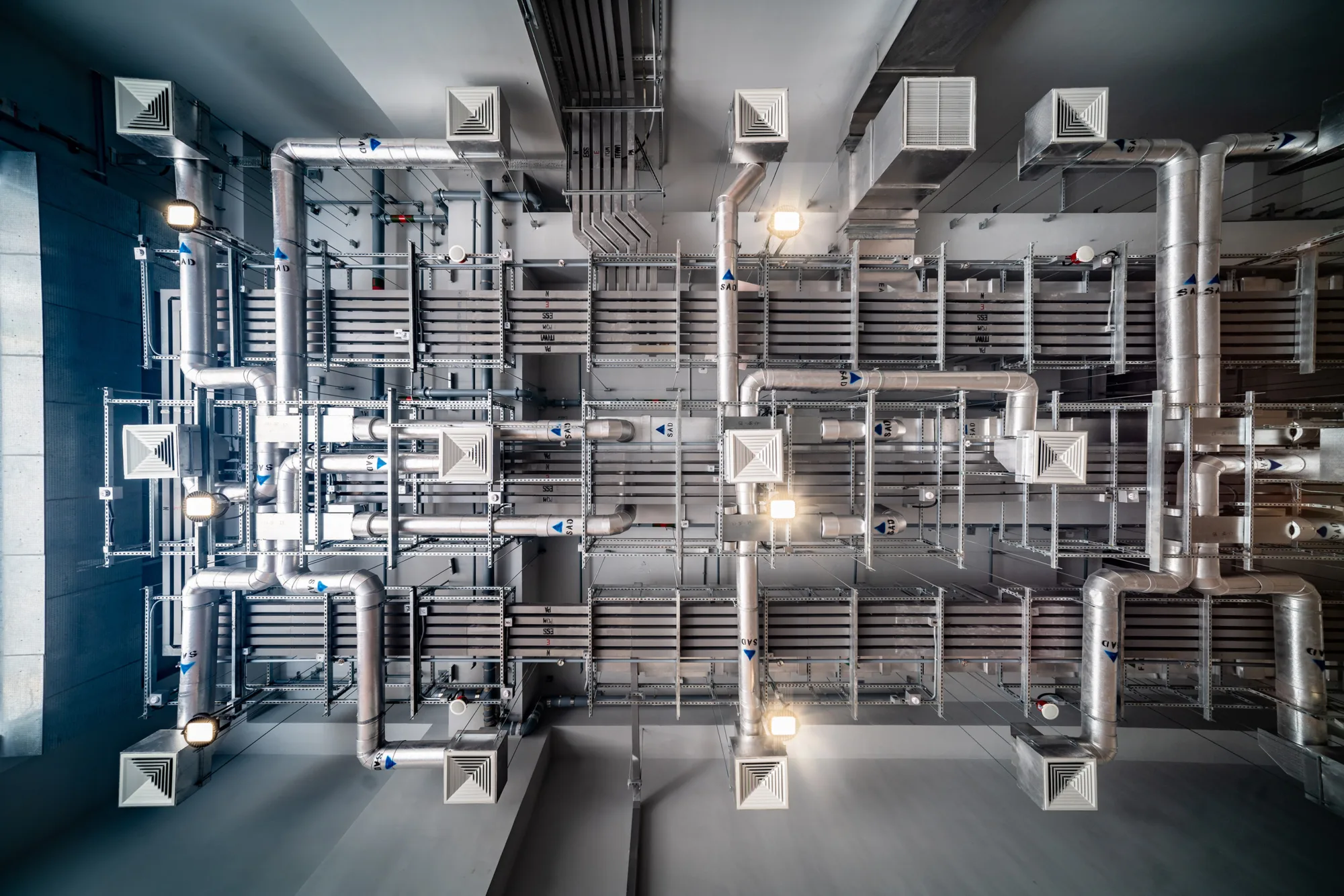 Ventilation system covering the ceiling of the Transport Department Vehicle Examination Complex