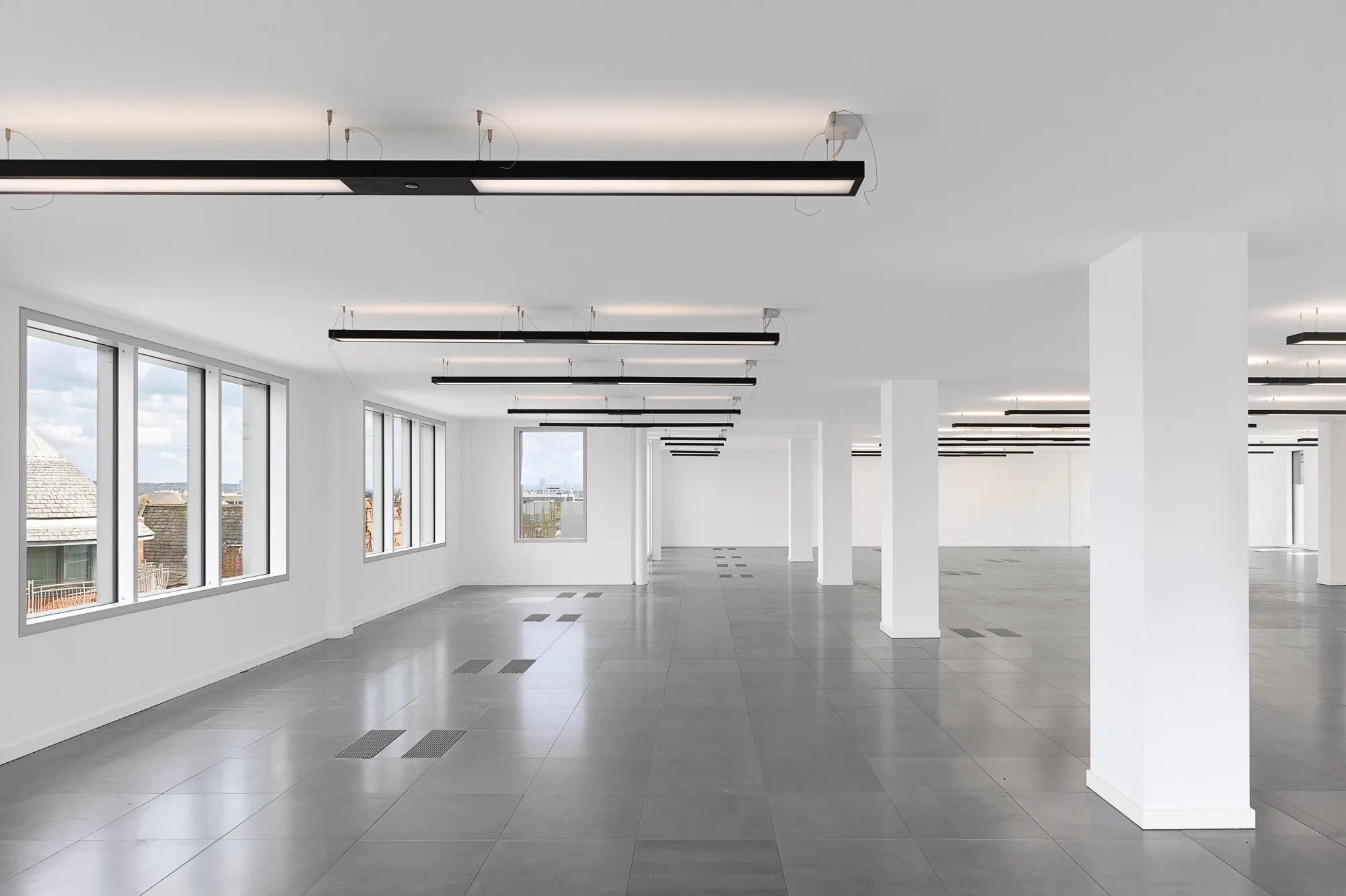 A bright, open plan and empty office space inside Wellington House