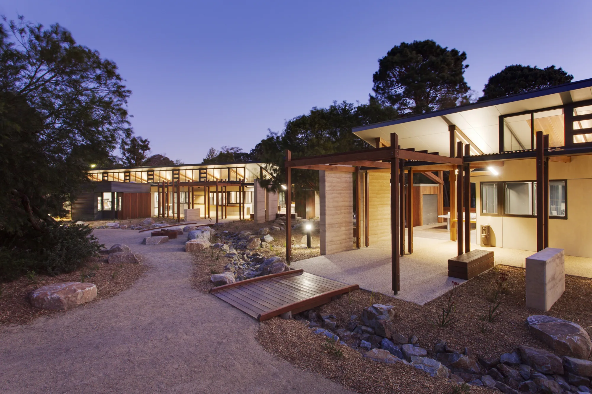 Exterior shot of two of the homestead building built near Melbourne at dusk