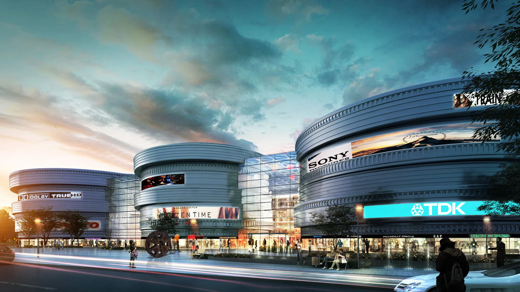 Street-level view of brightly lit mall’s exterior featuring large advertisement banners